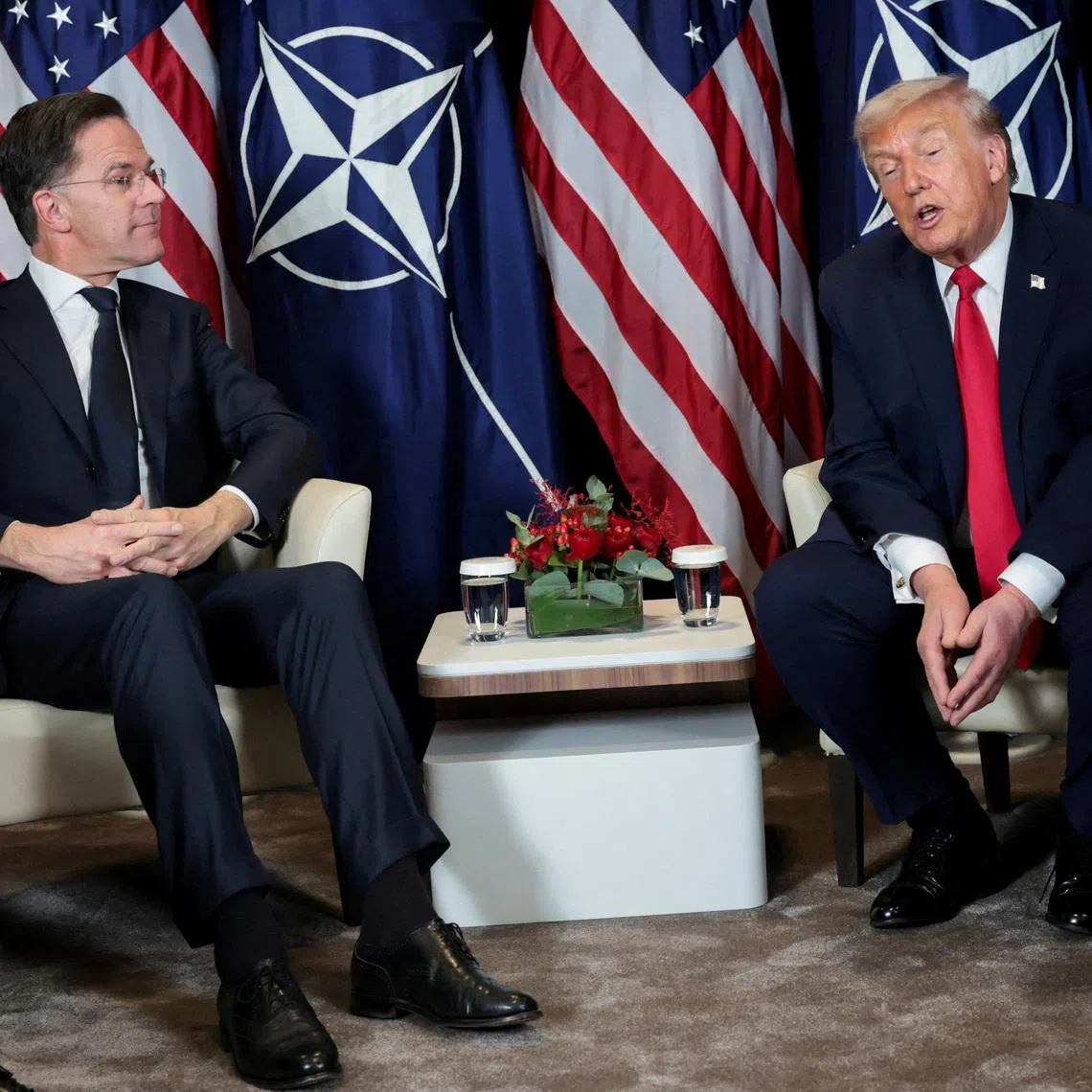 FILE PHOTO: U.S. President Donald Trump holds a bilateral meeting with NATO Secretary General Mark Rutte at the World Economic Forum (WEF) in Davos, Switzerland, January 21, 2026. REUTERS/Jonathan Ernst/File Photo