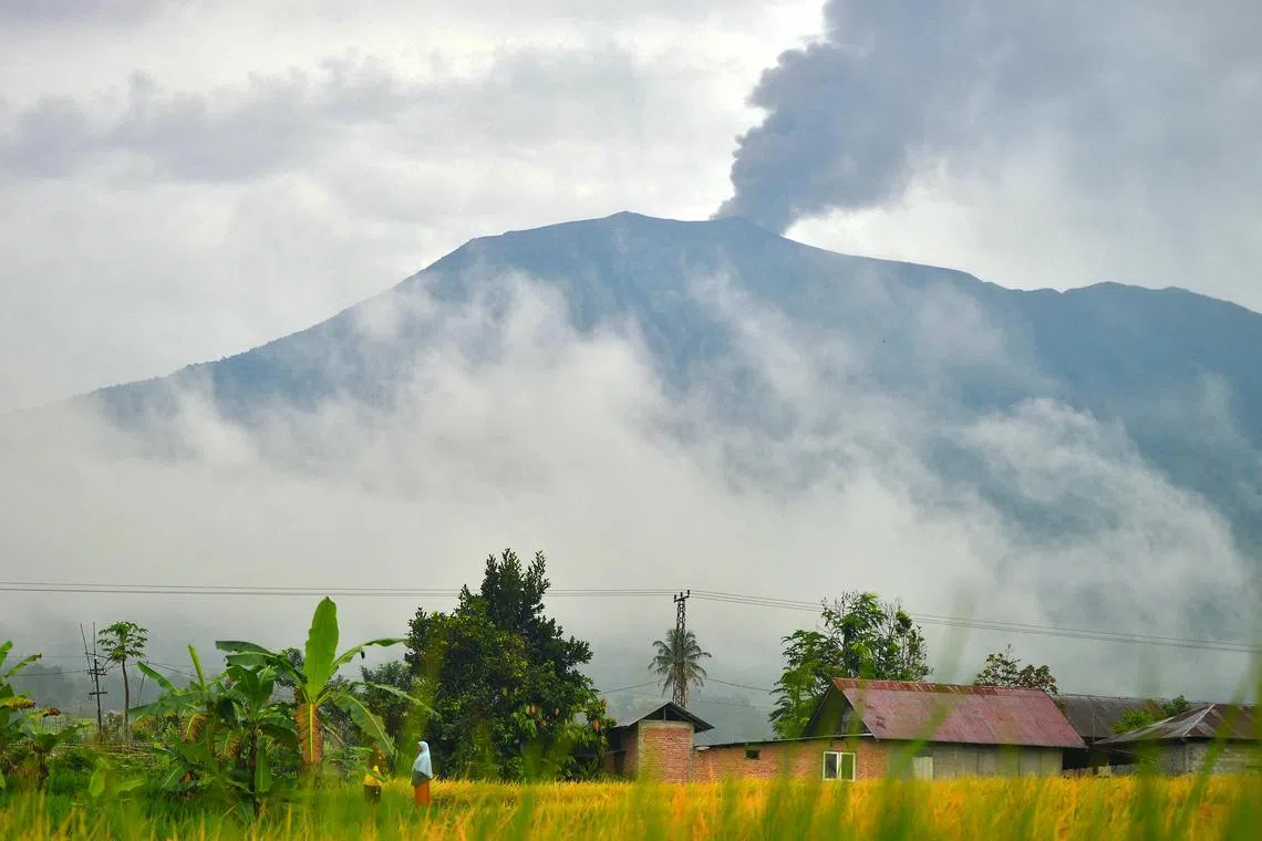 Mount Marapi on the island of Sumatra spewed an ash tower 3,000m into the sky on Dec 3 as 75 people hiked in the area.