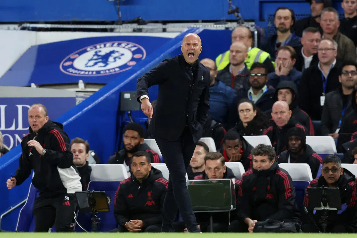 Soccer Football - Premier League - Chelsea v Liverpool - Stamford Bridge, London, Britain - October 4, 2025 Liverpool manager Arne Slot reacts REUTERS/David Klein EDITORIAL USE ONLY. NO USE WITH UNAUTHORIZED AUDIO, VIDEO, DATA, FIXTURE LISTS, CLUB/LEAGUE LOGOS OR 'LIVE' SERVICES. ONLINE IN-MATCH USE LIMITED TO 120 IMAGES, NO VIDEO EMULATION. NO USE IN BETTING, GAMES OR SINGLE CLUB/LEAGUE/PLAYER PUBLICATIONS. PLEASE CONTACT YOUR ACCOUNT REPRESENTATIVE FOR FURTHER DETAILS..