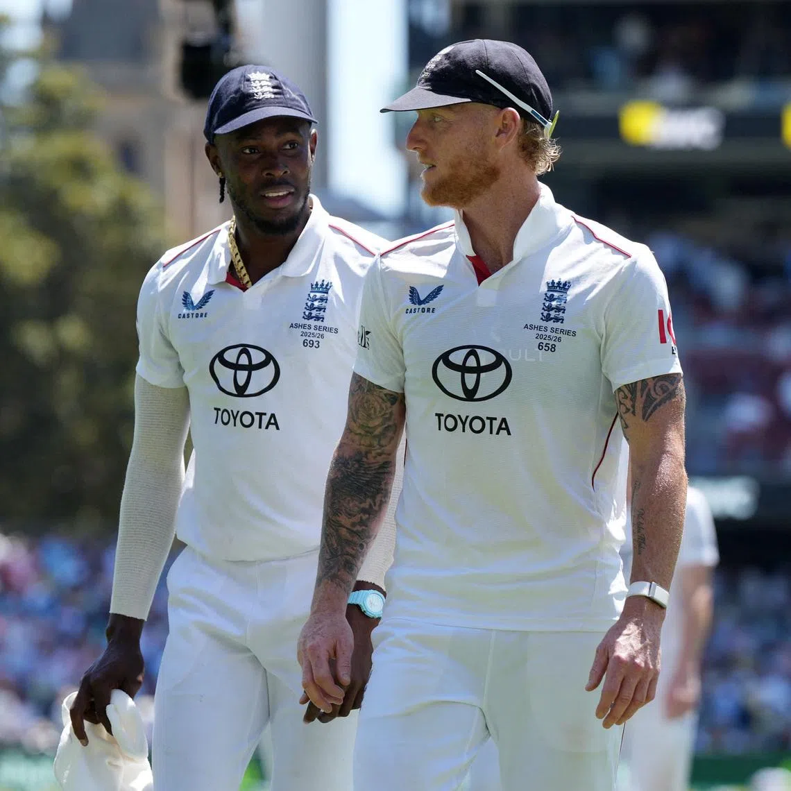 Cricket - The Ashes - Australia v England - Third Test - Adelaide Oval, Adelaide, Australia - December 20, 2025 England's Jofra Archer and Ben Stokes walk off after the end of Australia innings REUTERS/Asanka Brendon Ratnayake