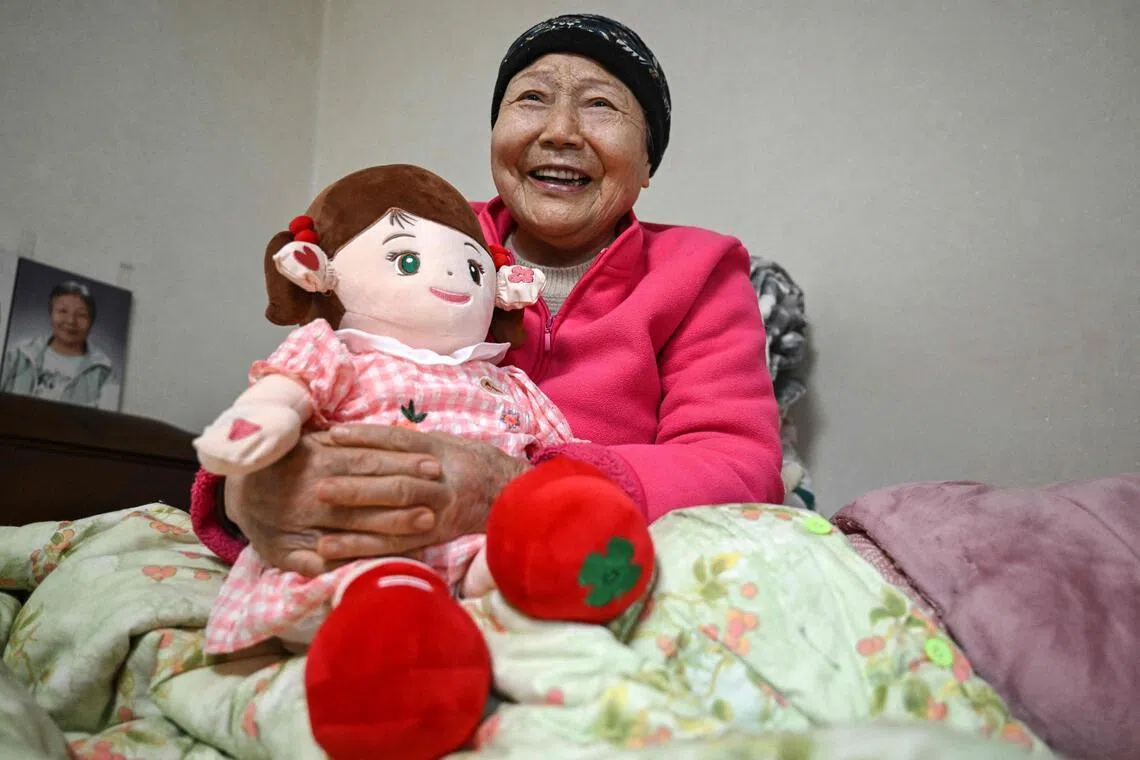 Kim Young-bun, 79, says her Hyodol is a source of comfort.