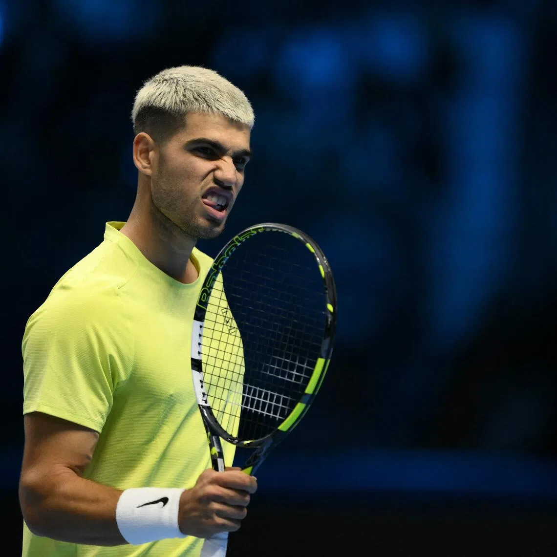 Spain's Carlos Alcaraz reacting during his 7-6 (7-5), 6-2 win over Australia's Alex de Minaur at the ATP Finals tennis tournament in Turin on Nov 9, 2025.
