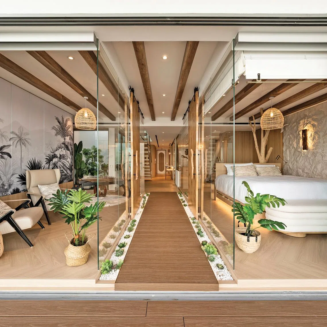 Designer Carmen Tang describes the lower level’s layout as that of a beach boulevard flanked by glass pavilions.