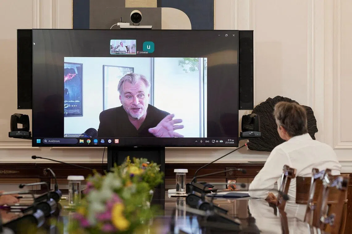 The Odyssey director Christopher Nolan talking to Greek Prime Minister Kyriakos Mitsotakis during a video call, in Athens, Greece, on July 28.