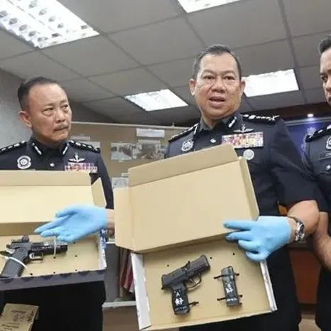 Mr Tan Lek Khang's two pistols, magazines, and bullets have been seized for investigation and ballistic tests.