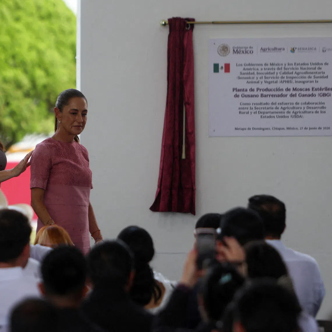 FILE PHOTO: U.S. Agriculture Secretary Brooke Rollins and Mexican President Claudia Sheinbaum attend the opening of a sterile fly production plant, a key step to contain the cross-border spread of the New World screwworm and its impact on cattle trade, in Metapa de Dominguez, Chiapas state, Mexico, June 27, 2026. REUTERS/Damian Sanchez/File Photo