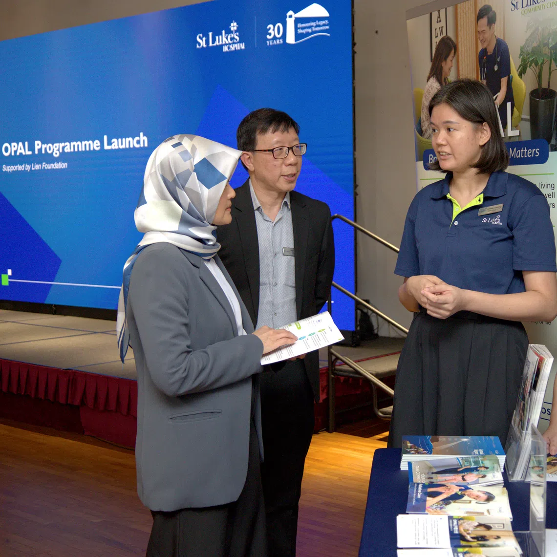 St Luke’s Hospital CEO Tan Boon Yeow (second from left) and Minister of State for Health Madam Rahayu Mahzam (left) at the Oct 27 launch of Opal, a primary palliative care programme that the community hospital co-developed with the Lien Foundation.  