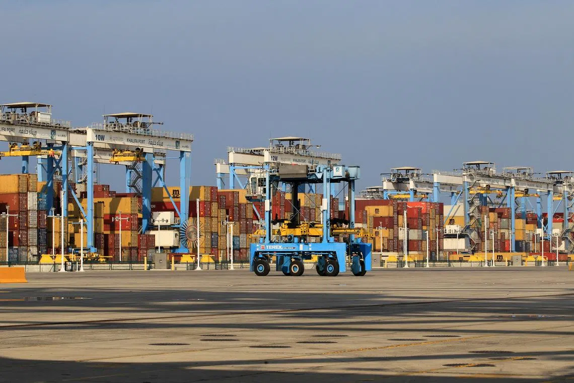Containers are seen at Abu Dhabi's Khalifa Port after it was expanded in Abu Dhabi, UAE, December 11, 2019. REUTERS/Satish Kumar