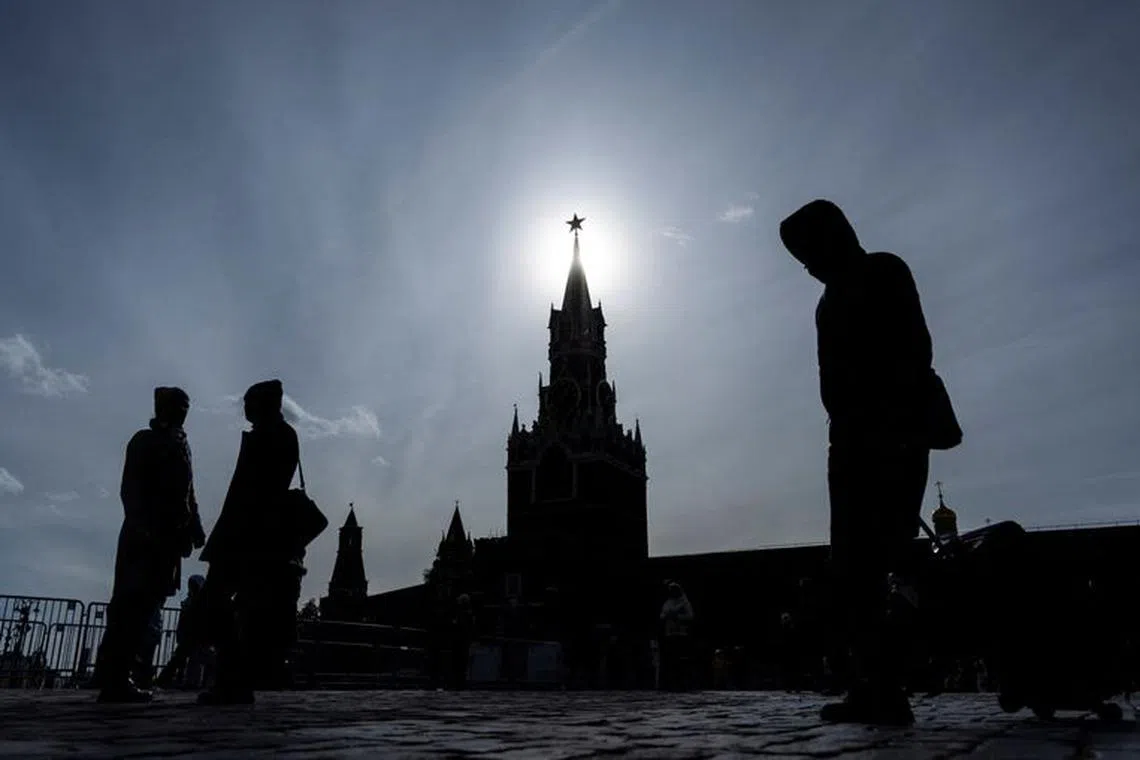 FILE PHOTO: People walk in Red Square on a sunny autumn day in Moscow, Russia October 11, 2023. REUTERS/Maxim Shemetov