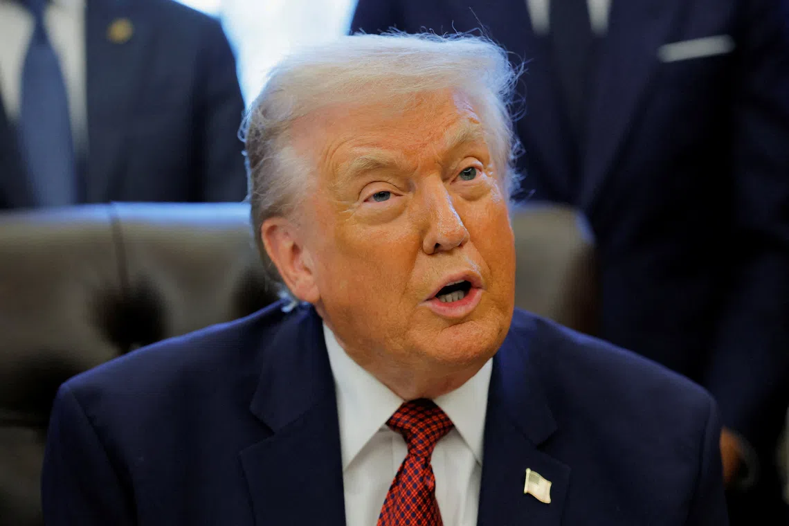 U.S. President Donald Trump speaks during an announcement of new fuel economy standards, in the Oval Office at the White House in Washington, D.C., U.S., December 3, 2025. REUTERS/Brian Snyder