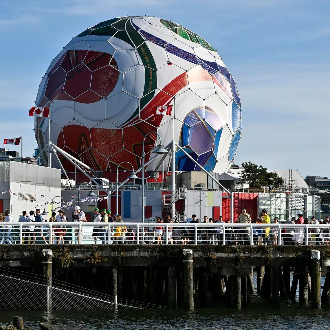Soccer Football - FIFA World Cup 2026 - Group D - Australia v Turkey - Fans gather in Vancouver - Vancouver, Canada - June 13, 2026 General view of fans near the giant football next to BC Place ahead of the match REUTERS/Jennifer Gauthier
