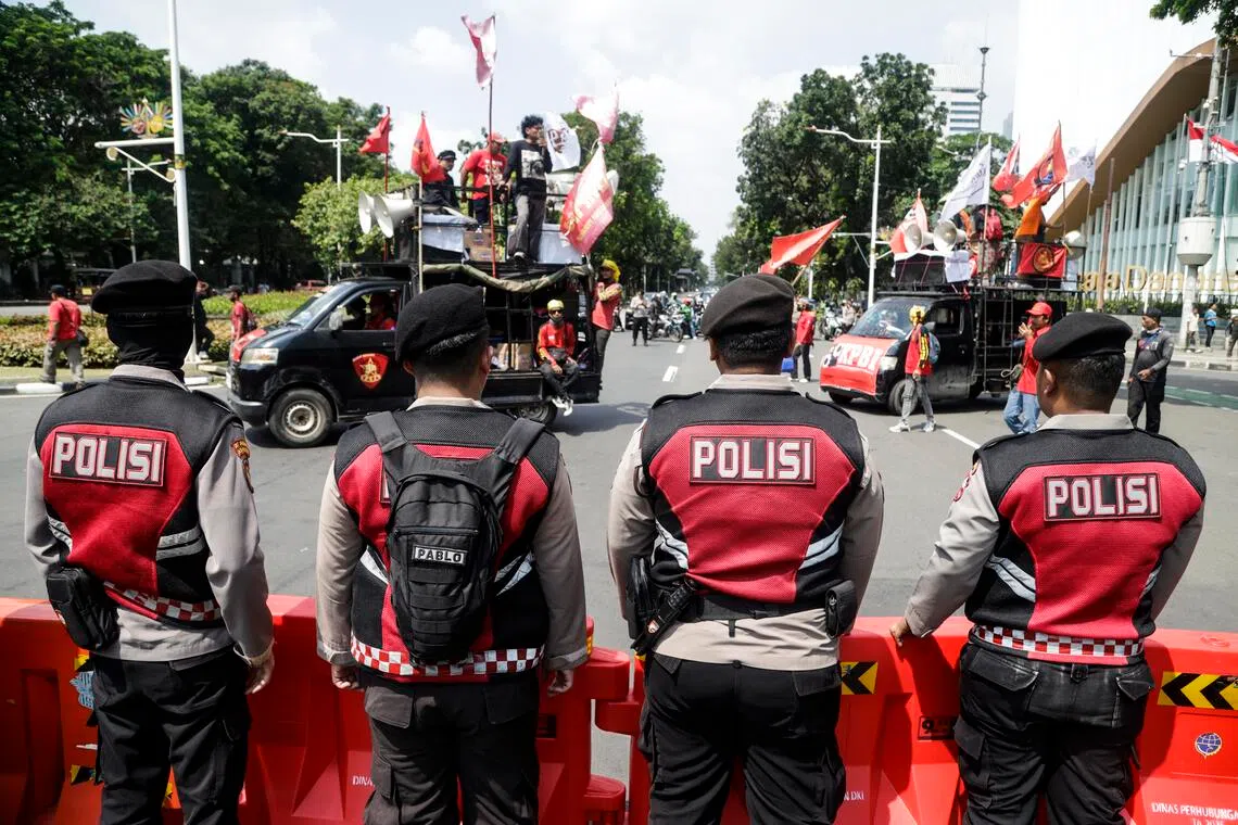 A police blockade during a demonstration against police violence in Jakarta, on Sept 4.