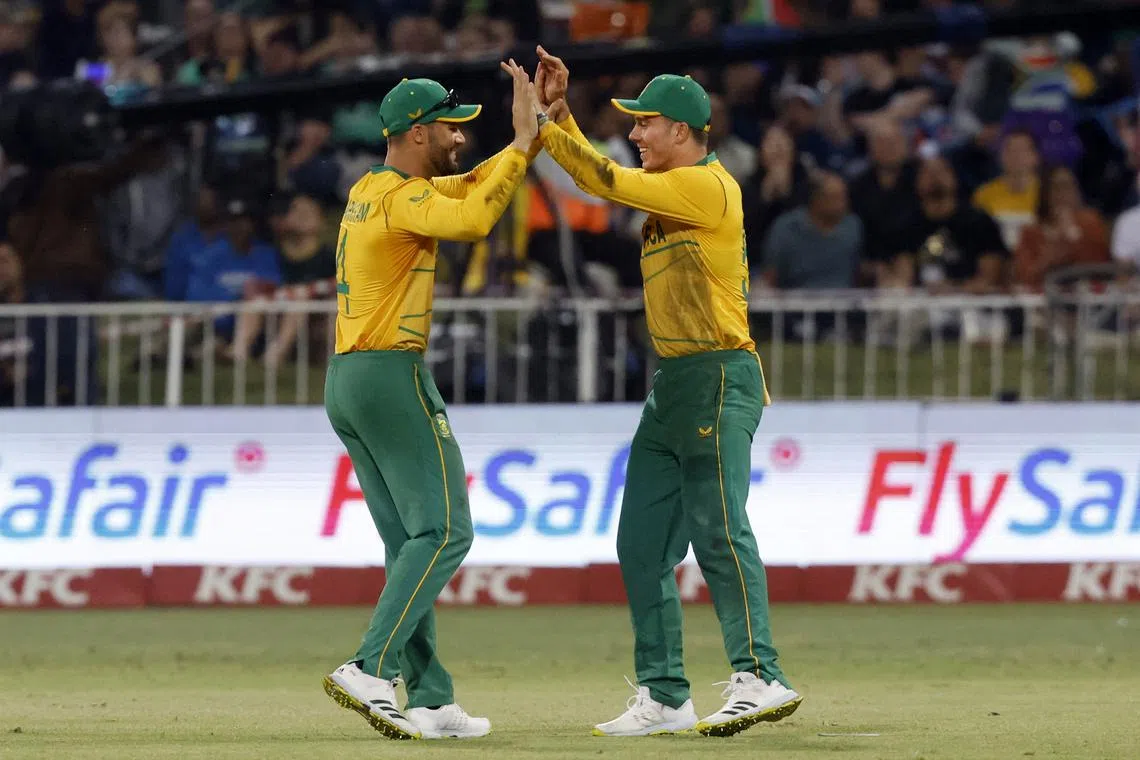 FILE PHOTO: Cricket - First T20 - South Africa vs Australia - Kingsmead Cricket Ground, Durban, South Africa - August 30, 2023 South Africa's Aiden Markram and Dewald Brevis celebrates after taking the wicket of Australia's Aaron Hardie REUTERS/Rogan Ward/File Photo