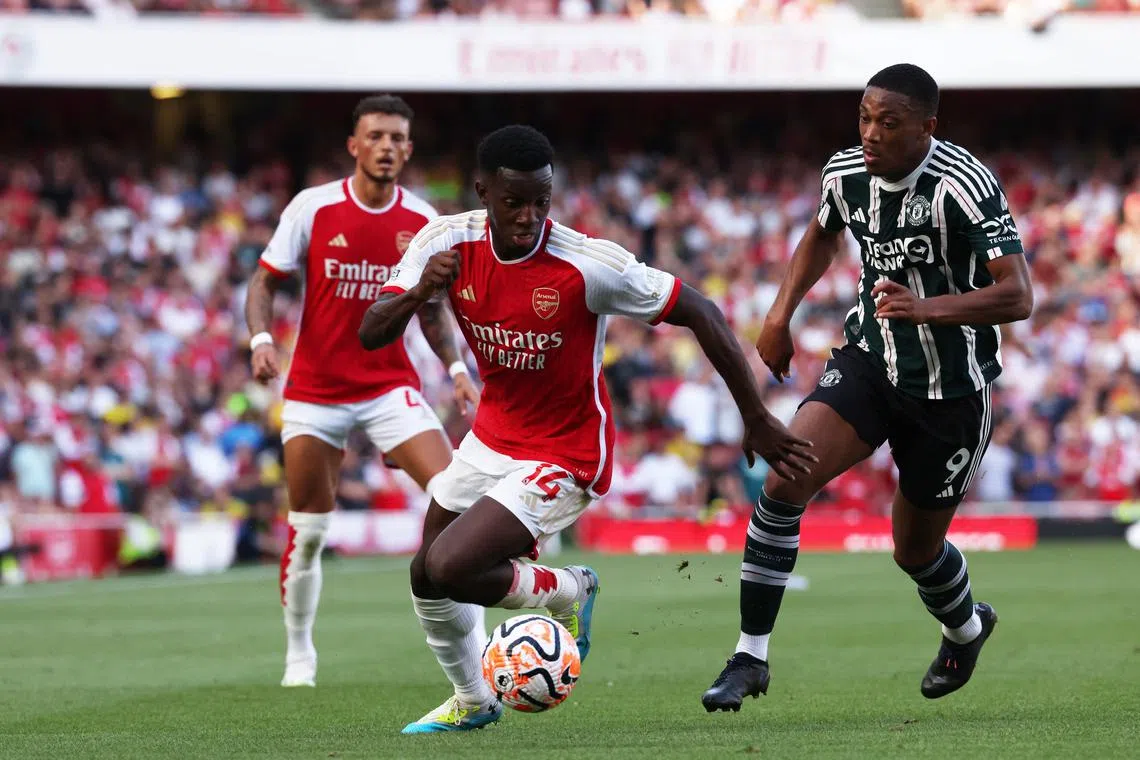 Arsenal’s Eddie Nketiah battling for the ball with Manchester United's Anthony Martial during their English Premier League clash at the Emirates.