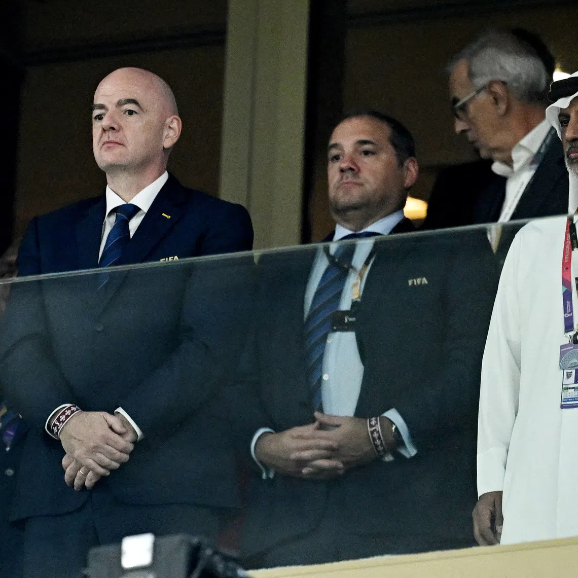 FILE PHOTO: Soccer Football - FIFA World Cup Qatar 2022 - Group H - Portugal v Uruguay - Lusail Stadium, Lusail, Qatar - November 28, 2022 FIFA president Gianni Infantino and President of the Qatar Football Association Sheikh Hamad bin Khalifa bin Ahmed Al Thani before the match REUTERS/Dylan Martinez/File Photo