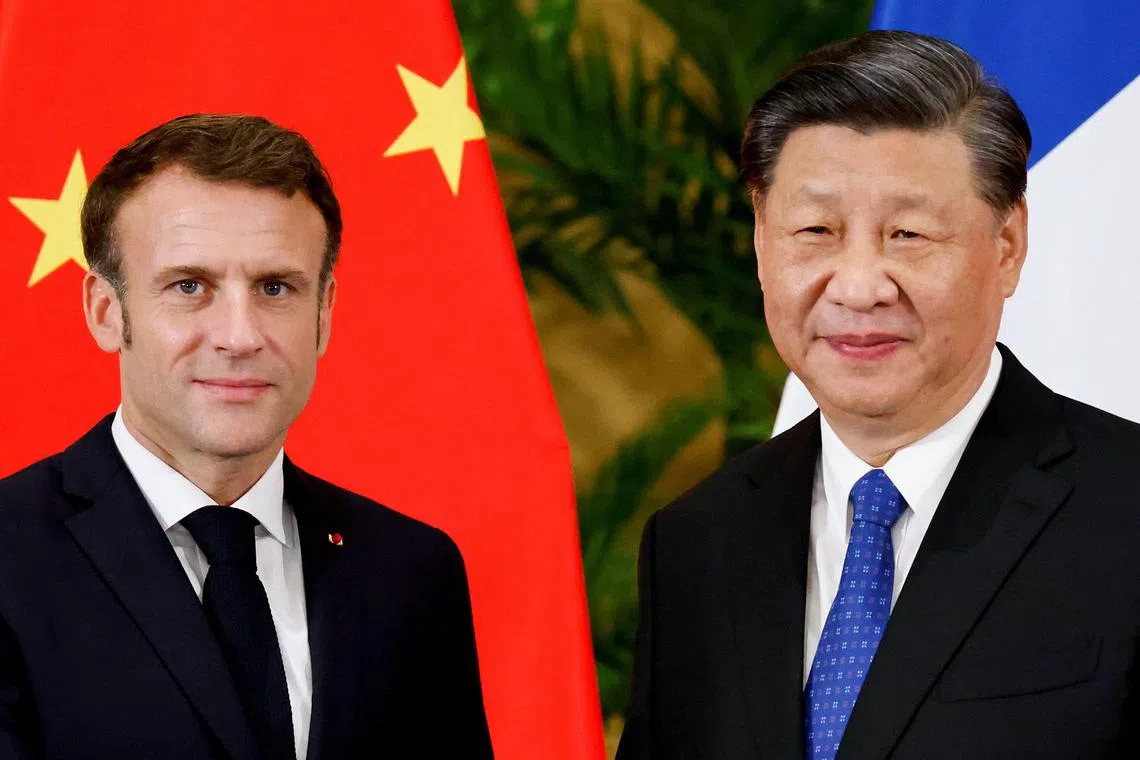 (FILES) In this file photo taken on November 15, 2022, French President Emmanuel Macron (L) meets with Chinese President Xi Jinping prior to their meeting in Nusa Dua on the Indonesian resort island of Bali on the sidelines of the G20 Summit. - French President Emmanuel Macron will visit China from April 5, 2023, hoping to dissuade Beijing from supporting Russia's invasion of Ukraine but without alienating a crucial trade and geopolitical player. (Photo by Ludovic MARIN / POOL / AFP)