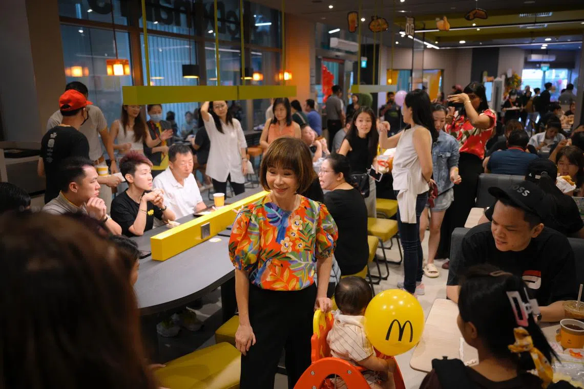 Hong Kah North MP Amy Khor (centre) at the McDonald’s fast-food restaurant on the opening day at Plantation Plaza on June 28.