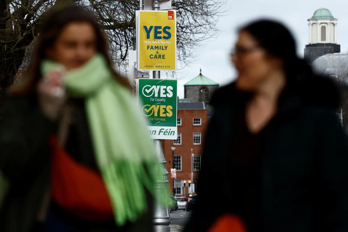 Signage is seen in relation to an upcoming 8th March referendum on changes to the Irish constitution called the Family Amendment and the Care Amendment, in Dublin, Ireland, March 3, 2024. REUTERS/Clodagh Kilcoyne/File Photo