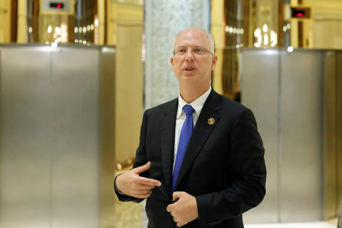 The head of Russia's sovereign wealth fund Kirill Dmitriev speaks to members of the delegation and journalists after the U.S.-Russia talks in Riyadh, Saudi Arabia, February 18, 2025. REUTERS/Maxim Shemetov/File Photo