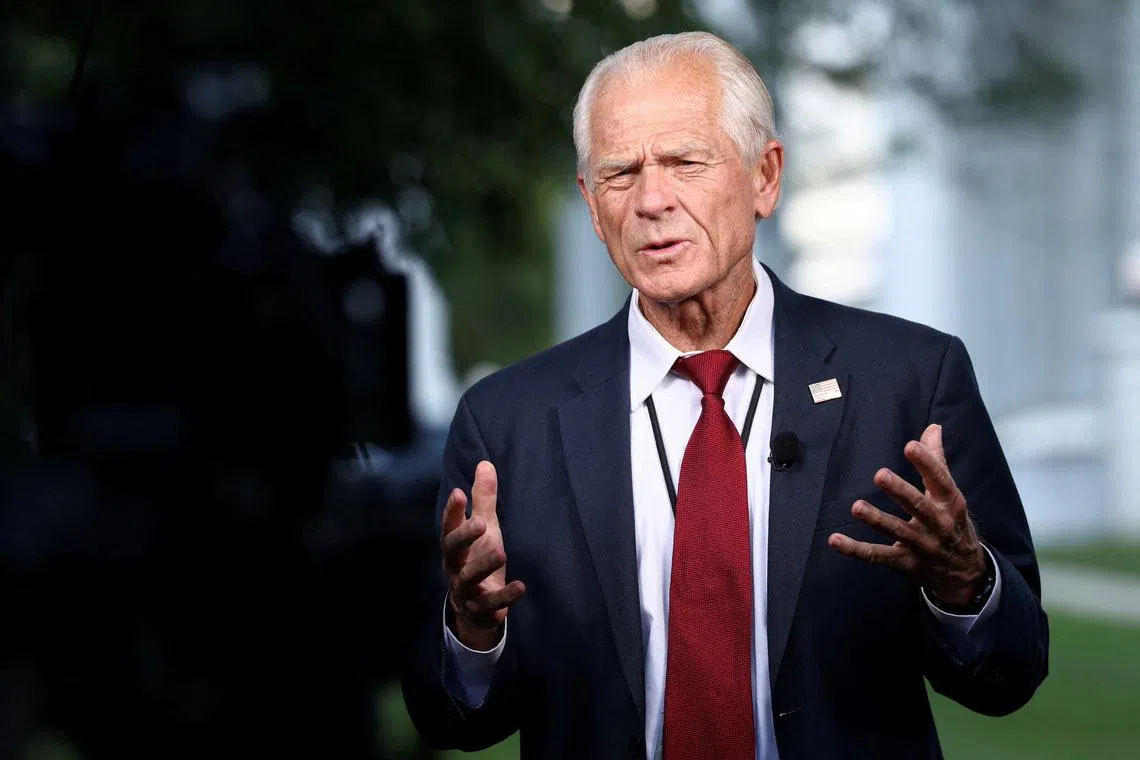 FILE PHOTO: White House trade advisor Peter Navarro speaks in front of TV camera at White House in Washington, D.C., U.S., July 7, 2025. REUTERS/Kevin Lamarque/File Photo
