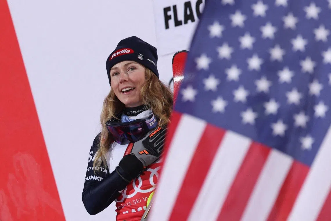 Alpine Skiing - FIS Alpine Ski World Cup - Women's Night Slalom - Flachau, Austria - January 13, 2026 Mikaela Shiffrin of the U.S celebrates on podium after winning the Women's Slalom REUTERS/Gintare Karpaviciute