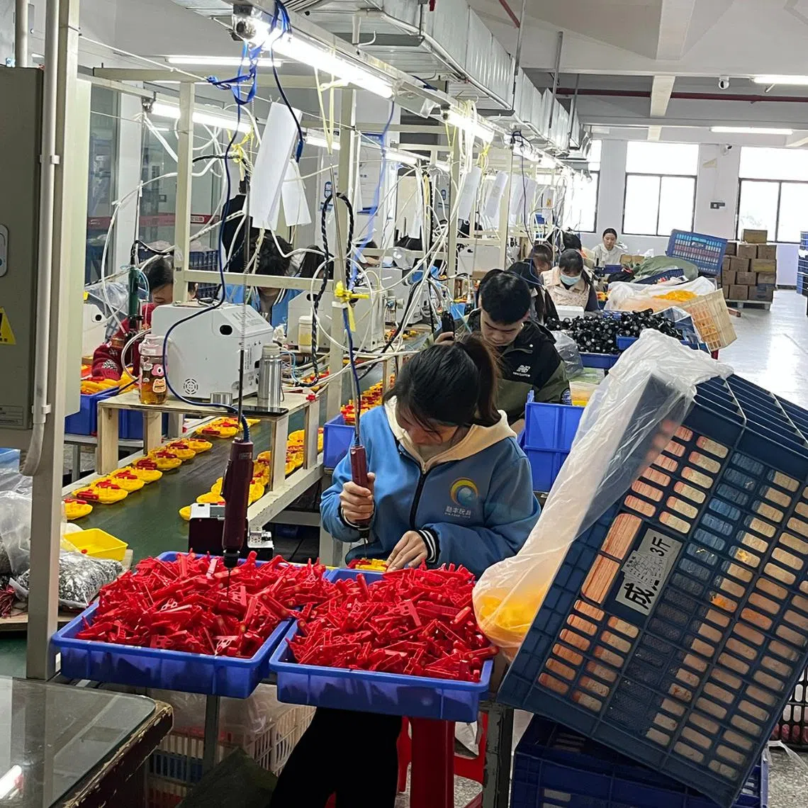 Workers at a Qinfeng Toys factory in Shantou, China. 