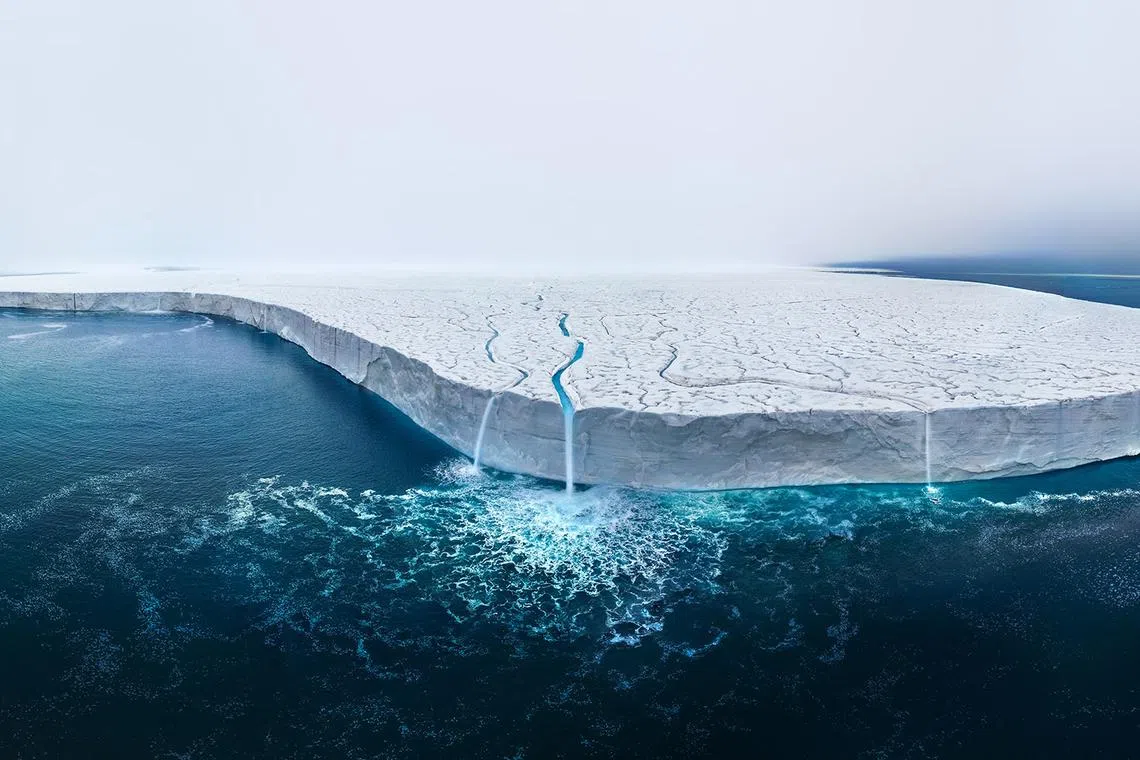 The BrÂsvellbreen glacier, a stunning component of the Austfonna Ice Cap, presents a breathtaking view, especially in the height of summer when meltwater cascades dramatically over its edge. Positioned within the Svalbard archipelago, this icy expanse ranks as Europe's third-largest ice cap, spanning an awe-inspiring 8,000 square kilometers on Nordaustlandet Island. However, this magnificent landscape is not merely a sight of natural beautyóit's a poignant symbol of our changing world.

During my latest expedition to Austfonna, I was drawn to an extraordinary scene, capturing it with a sense of urgency. The sea ice, which usually acts as a protective barrier, had retreated unusually early, allowing access by ship and exposing the glacier to an accelerated melt. As I framed the shot, the waterfall created by the melting ice was both mesmerizing and unsettlingóa powerful image of a landscape in flux.

This photograph, composed of 26 meticulously stitched frames, captures the ephemeral beauty of BrÂsvellbreen while also serving as a stark reminder of the glacier's vulnerability. As I stood there, witnessing the gradual disappearance of this icy giant, I couldn't help but reflect on the broader implications of climate change, which threatens not just this glacier, but countless others around the world. The image is a tribute to the fragile grandeur of nature and a call to action to preserve these wonders for future generations.

Thomas Vijayan, is a passionate photographer, he has traveled across all seven continents capturing natureís beauty. Specializing in big cats, he's photographed rare species like the Amur Tiger and won over 1000+ awards. A Nikon Brand Ambassador, he treasures photography as a blend of nature, travel, patience, and passion.

Follow Thomas on Instagram @thomasvijayan.