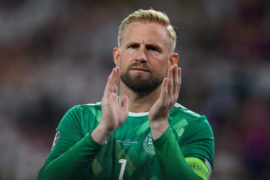 FILE PHOTO: Soccer Football - Euro 2024 - Round of 16 - Germany v Denmark - Dortmund BVB Stadion, Dortmund, Germany - June 29, 2024 Denmark's Kasper Schmeichel applauds fans after the match REUTERS/Thilo Schmuelgen/File Photo