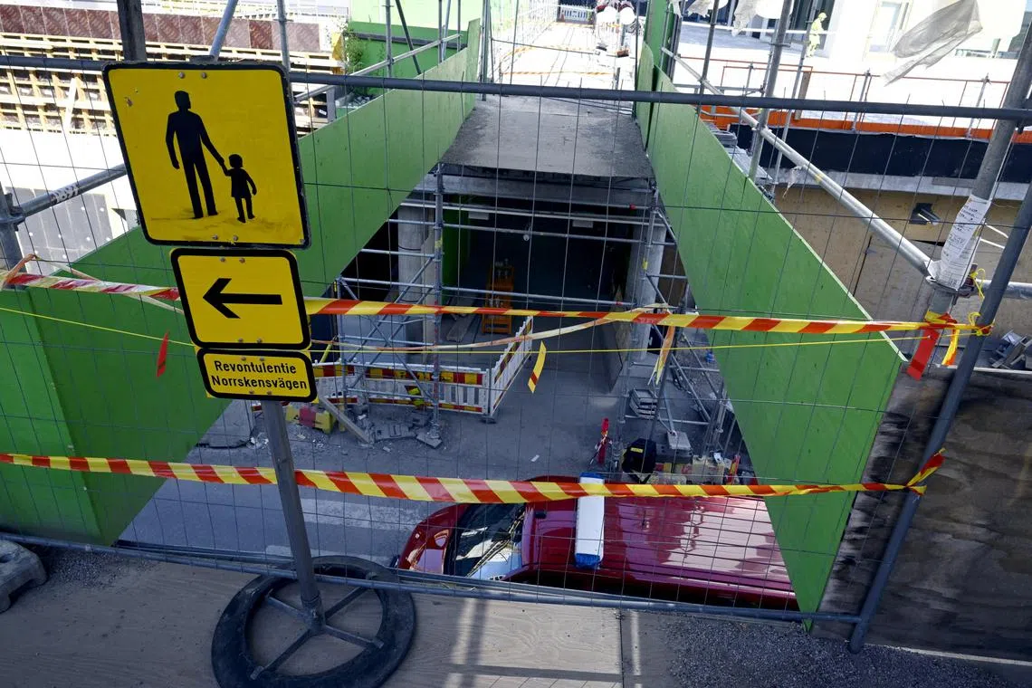 A view of a collapsed pedestrian bridge in Espoo, Finland.  A group of children were crossing the bridge when it collapsed.