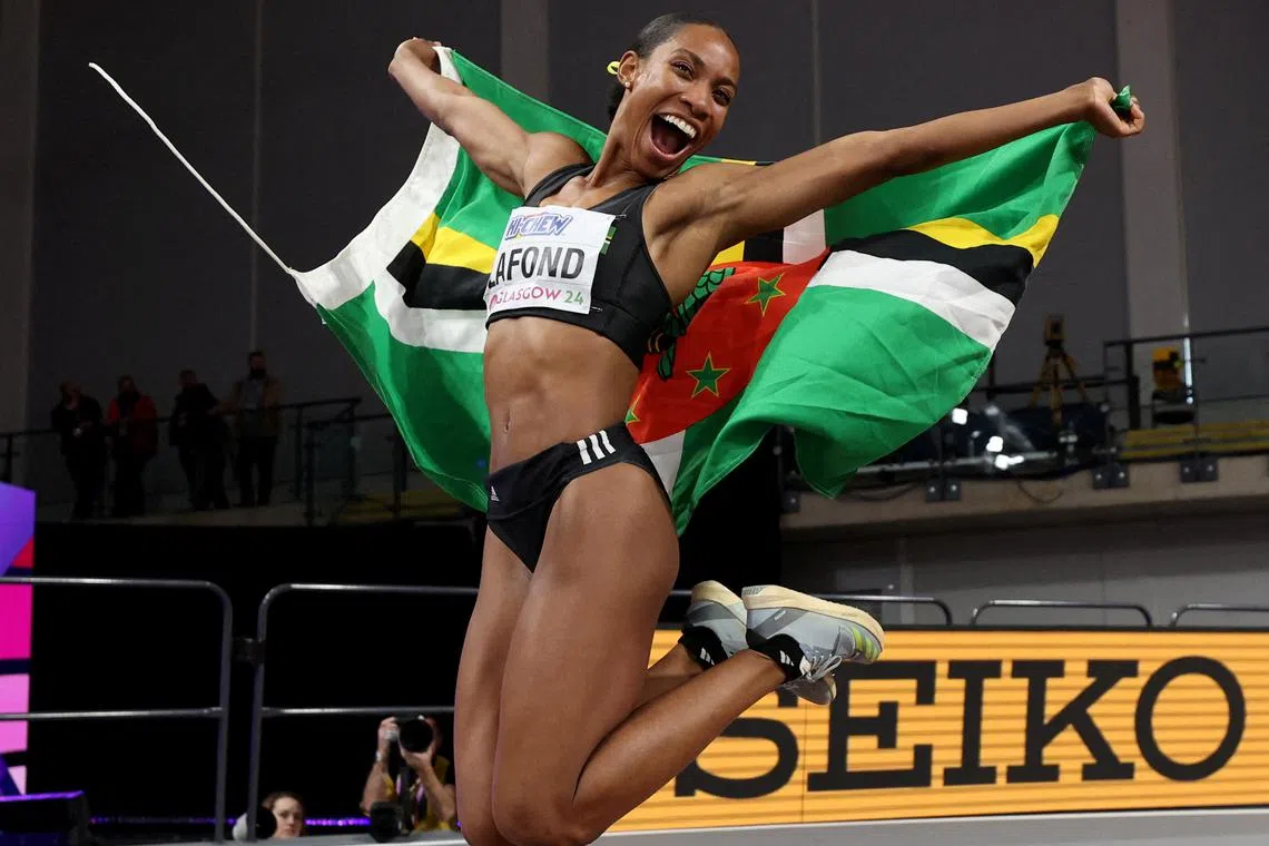 Athletics - World Athletics Indoor Championships - Commonwealth Arena, Glasgow, Scotland, Britain - March 3, 2024 Commonwealth of Dominica Thea Lafond celebrates after winning the women's triple jump final REUTERS/Paul Childs