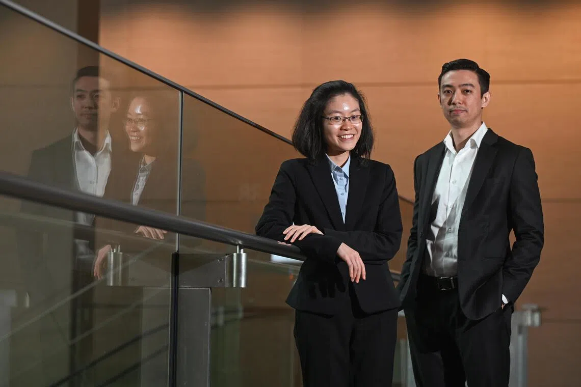 Lawyers Iris Ng (left), 30, from Helmsman and Jonathan Trachsel (right), 34, from Allen & Gledhill, who were appointed under the Young Independent Counsel (YIC) scheme, on Oct 2.
