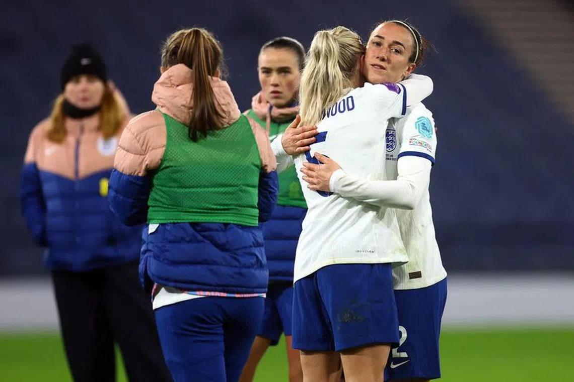 Soccer Football - UEFA Women's Nations League - Group A - Scotland v England - Hampden Park, Glasgow, Scotland, Britain - December 5, 2023 England's Alex Greenwood and Lucy Bronze look dejected after Team GB failed to qualify for the Paris 2024 Olympics REUTERS/Carl Recine