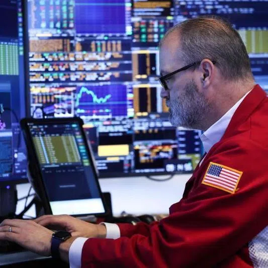 A trader works on the floor of the New York Stock Exchange in New York on Jan 12, 2026.