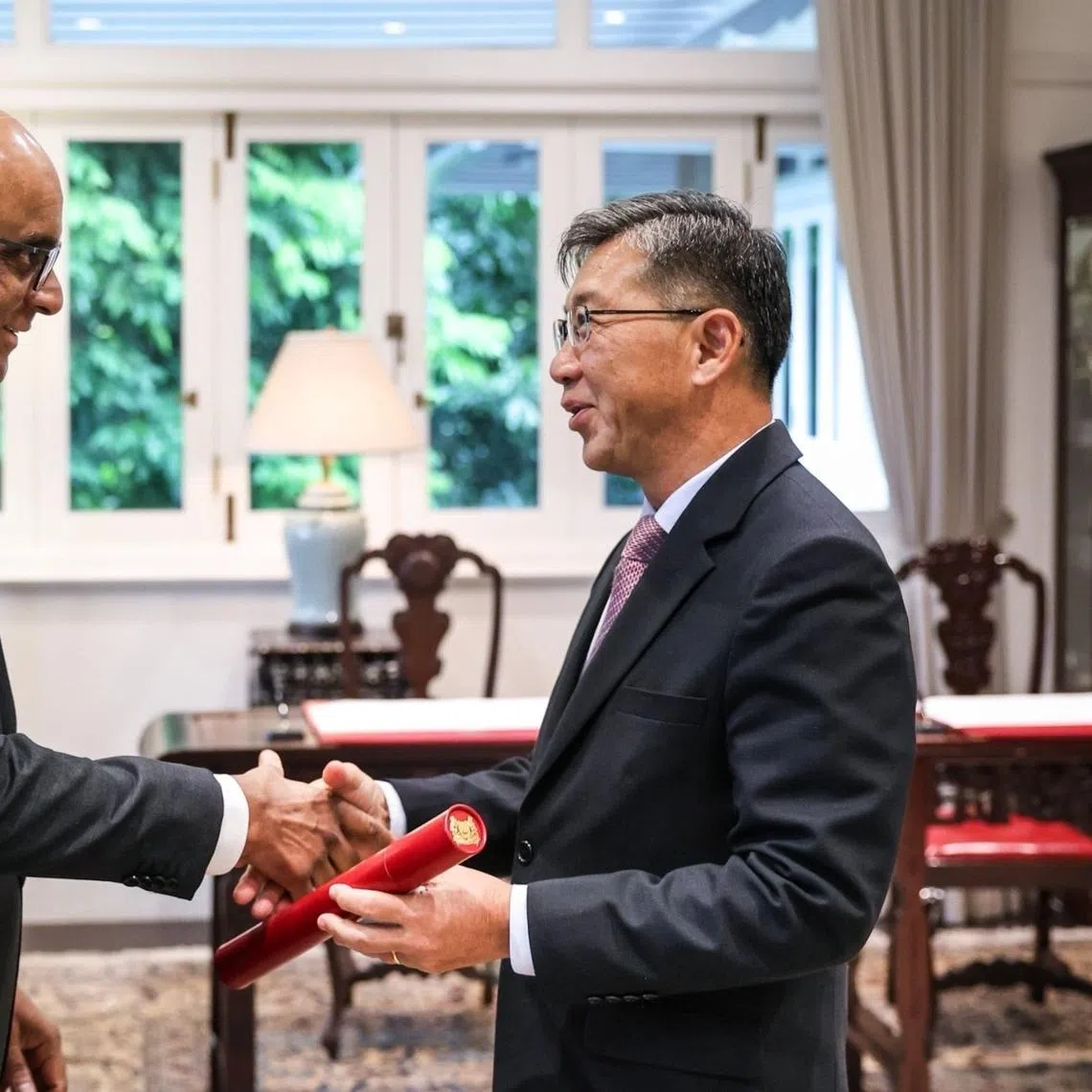 President Tharman Shanmugaratnam (left)and new chairman of the Council of Presidential Advisers Tan Chong Meng.
