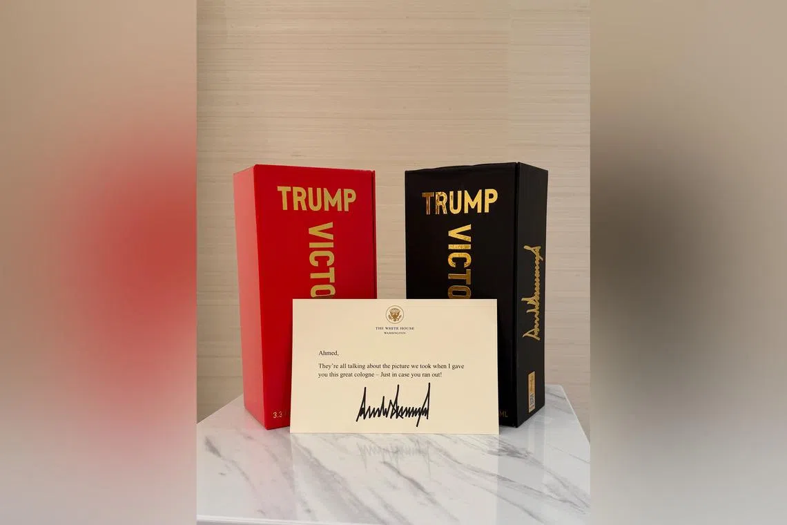 Syrian leader Ahmed al-Sharaa posted an image of two Trump-branded fragrance boxes, one red and the other black.