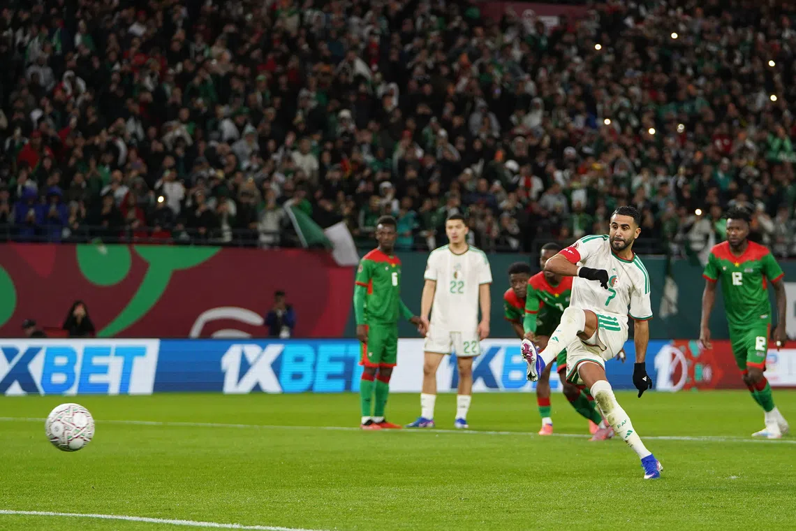 Soccer Football - CAF Africa Cup of Nations - Morocco 2025 - Group C - Algeria v Burkina Faso - Prince Moulay Hassan Stadium, Rabat, Morocco - December 28, 2025 Algeria's Riyad Mahrez scores their first goal from the penalty spot REUTERS/Stringer