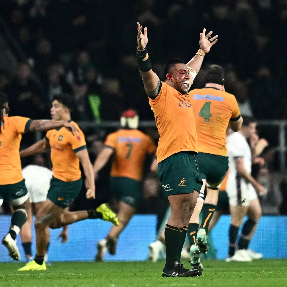 FILE PHOTO: Rugby Union - Autumn Internationals - England v Australia - Allianz Stadium Twickenham, London, Britain - November 9, 2024 Australia's Allan Alaalatoa celebrates as teammate Max Jorgensen scores their fifth try REUTERS/Dylan Martinez/File Photo