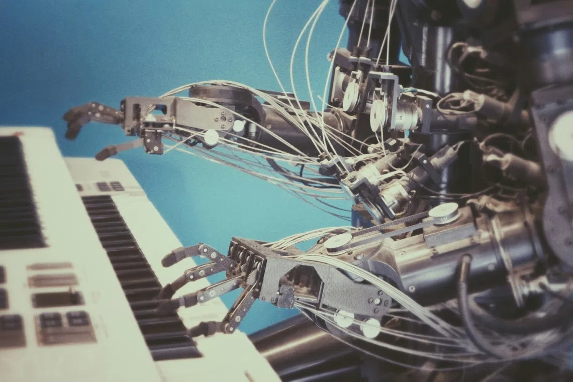 straitstimes.com - Australia bans AI-generated songs from top music charts