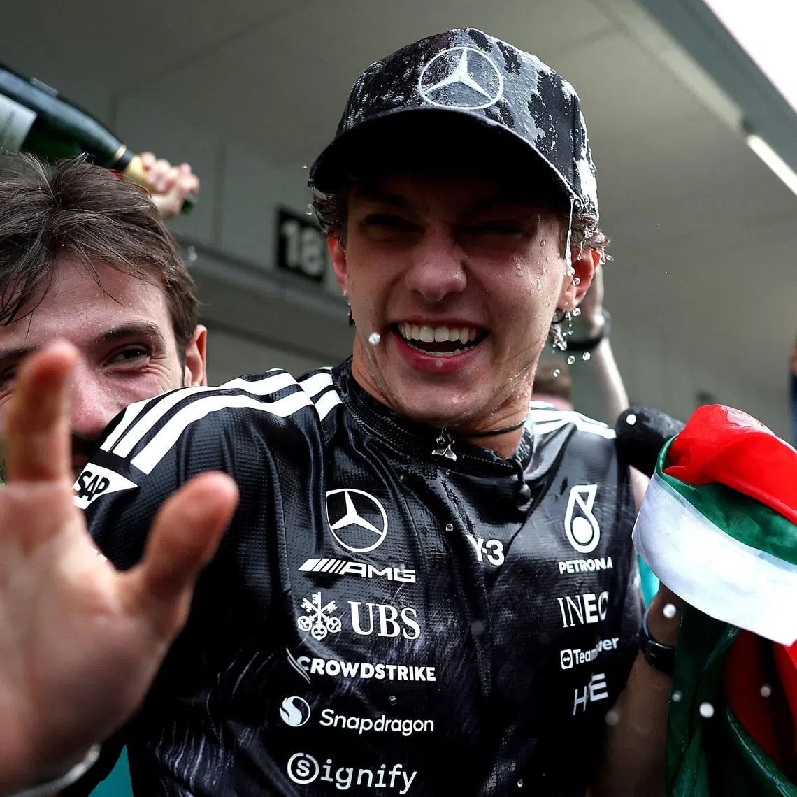 Formula One F1 - Japanese Grand Prix - Suzuka Circuit, Suzuka, Japan - March 29, 2026 Mercedes' Andrea Kimi Antonelli celebrates with his team after winning the Japanese Grand Prix REUTERS/Jakub Porzycki