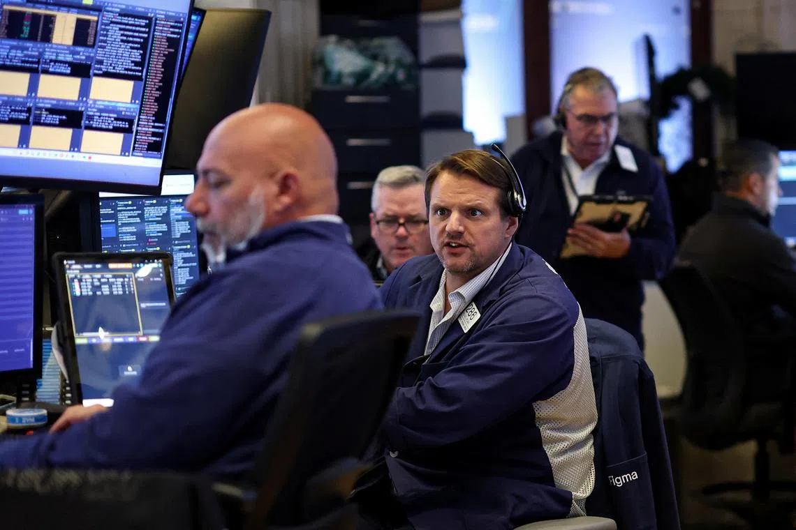 Traders working on the floor of the New York Stock Exchange, in New York City, on Sept 9.