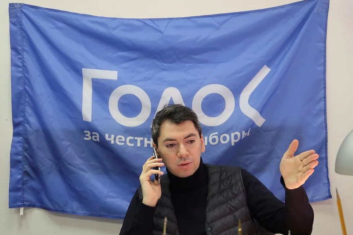 Co-chairman of Golos non-governmental organisation Grigory Melkonyants speaks on the phone at his office in Moscow, Russia March 13, 2018. Picture taken March 13, 2018. REUTERS/Andrew Osborn