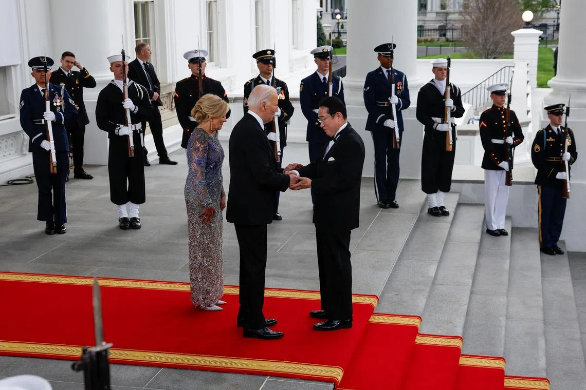 President Joe Biden and first lady Jill Biden welcome Japanese Prime Minister Fumio Kishida at the North Portico for an official State Dinner at the White House in Washington, U.S., April 10, 2024. REUTERS/Evelyn Hockstein