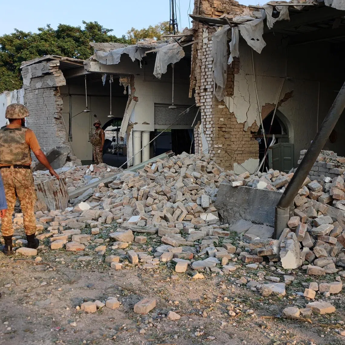 With fighting still ongoing, a police official reports at least 16 police personnel have died and over 100 people are injured.