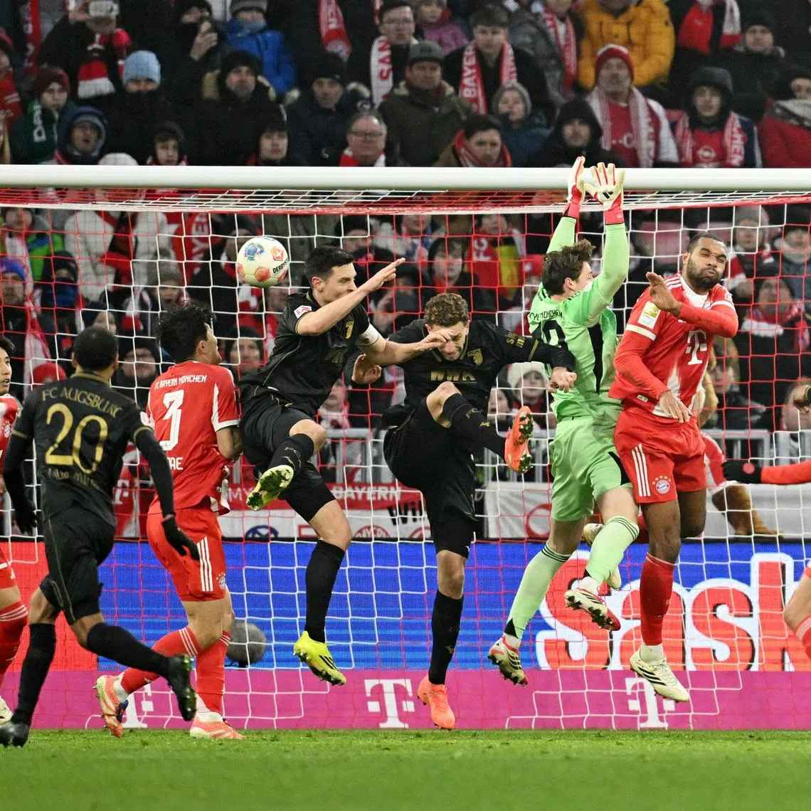 Soccer Football - Bundesliga - Bayern Munich v FC Augsburg - Allianz Arena, Munich, Germany - January 24, 2026 FC Augsburg's Arthur Chaves scores their first goal REUTERS/Angelika Warmuth