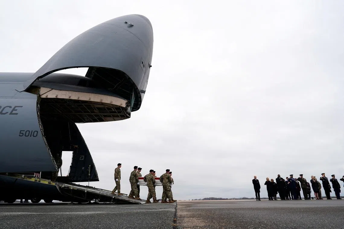 FILE PHOTO: U.S. President Joe Biden, first lady Jill Biden, Secretary of Defense Lloyd J. Austin III and Chairman of the Joint Chiefs of Staff and Air Force General Charles Q. Brown attend the dignified transfer of the remains of Army Reserve Sergeants William Rivers, Kennedy Sanders and Breonna Moffett, three U.S. service members who were killed in Jordan during a drone attack carried out by Iran-backed militants, at Dover Air Force Base in Dover, Delaware, U.S., February 2, 2024. REUTERS/Joshua Roberts/File Photo