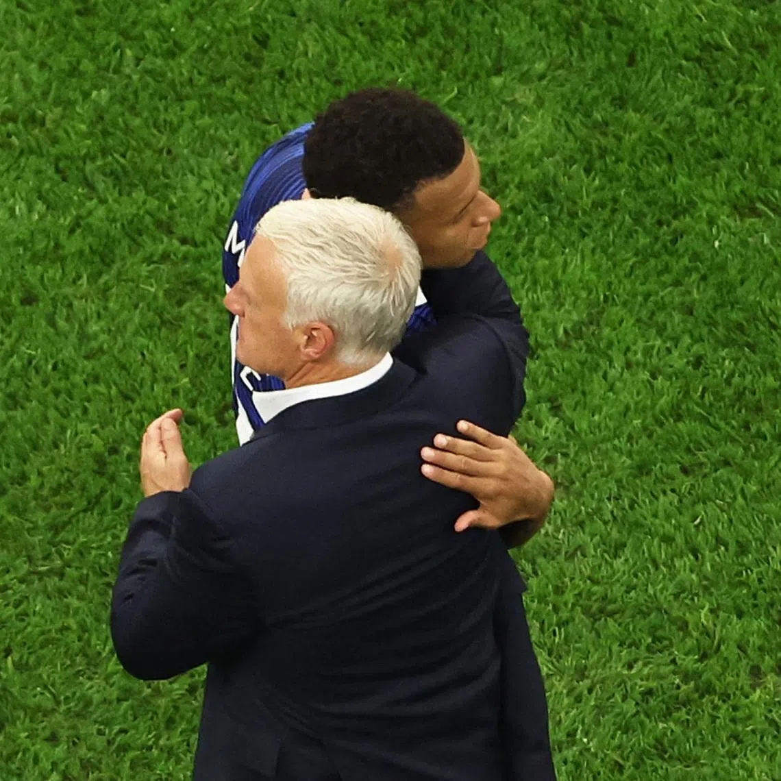 Soccer Football - FIFA World Cup 2026 - Semi Final - France v Spain - Dallas Stadium, Arlington, Texas, U.S. - July 14, 2026 France's Kylian Mbappe with coach Didier Deschamps after the match IMAGN IMAGES via Reuters/Tim Heitman