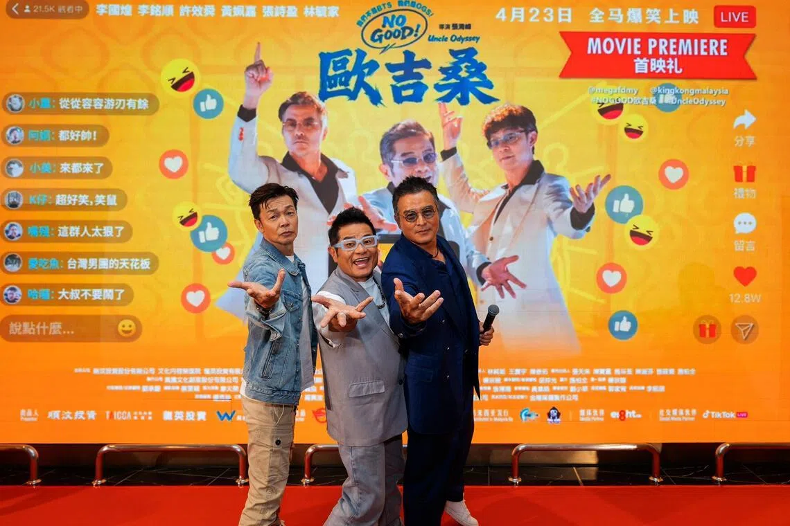 Singaporean actors Mark Lee (left), Christopher Lee (right) and Taiwanese actor Hsu Hsiao-shun (centre) promoting their upcoming film Uncle Odyssey, which opens here on April 16.