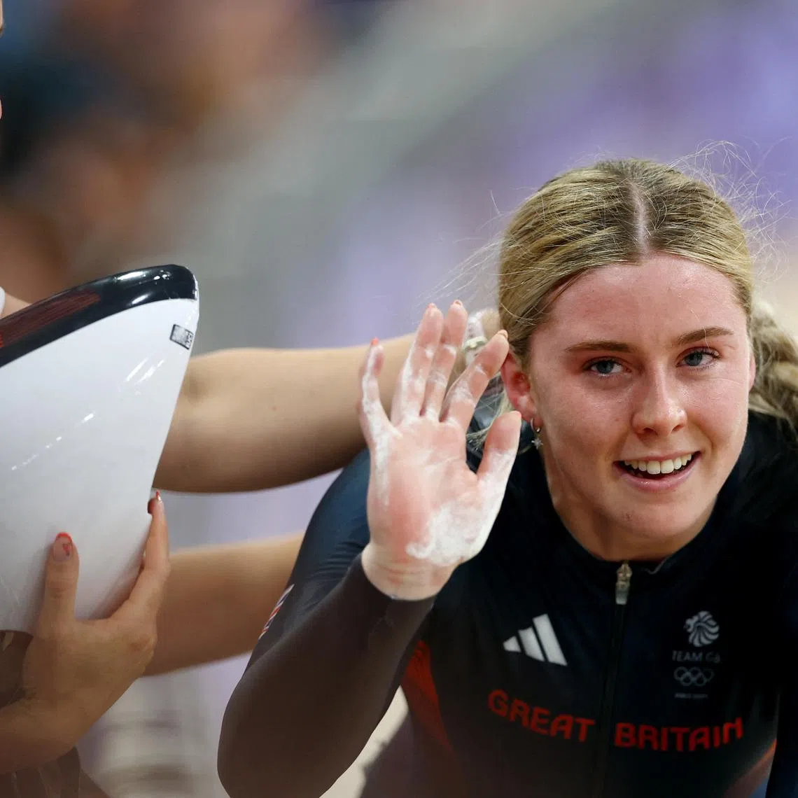 FILE PHOTO: Paris 2024 Olympics - Track Cycling - Women's Sprint, Finals - Race 2 - Saint-Quentin-en-Yvelines Velodrome, Montigny-le-Bretonneux, France - August 11, 2024. Emma Finucane of Britain celebrates after winning bronze. REUTERS/Matthew Childs