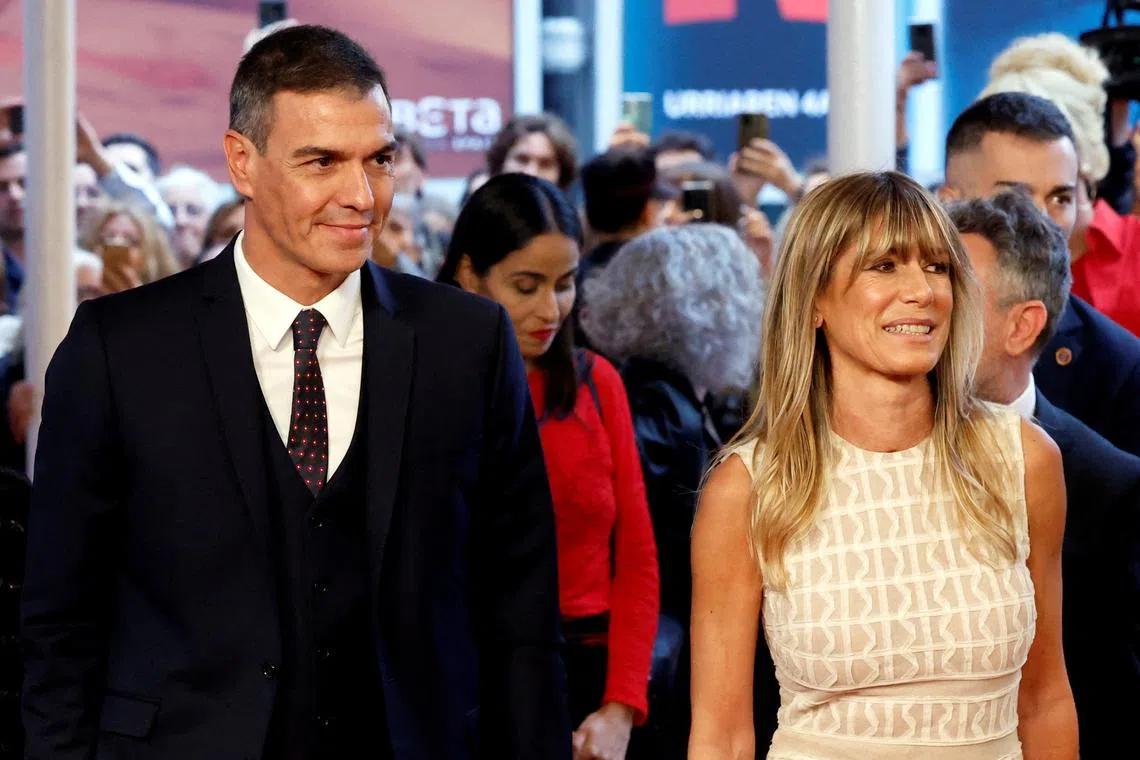 FILE PHOTO: Spain's Prime Minister Pedro Sanchez and his wife Begona Gomez arrive to San Sebastian Film Festival, in San Sebastian, Spain, September 26, 2024. REUTERS/Vincent West/File Photo