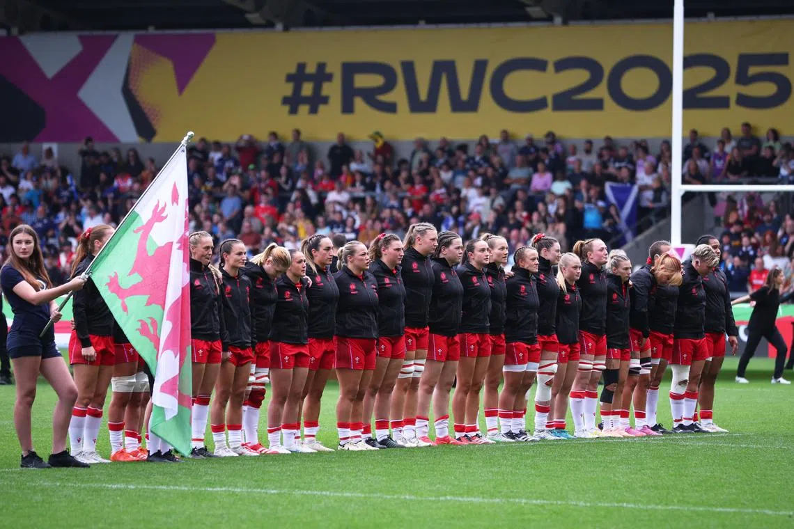 FILE PHOTO: Rugby Union - Women's World Cup 2025 - Pool B - Scotland v Wales - Salford Community Stadium, Salford, Britain - August 23, 2025 Wales players line up for the national anthems before the match Action Images via Reuters/Craig Brough/File Photo